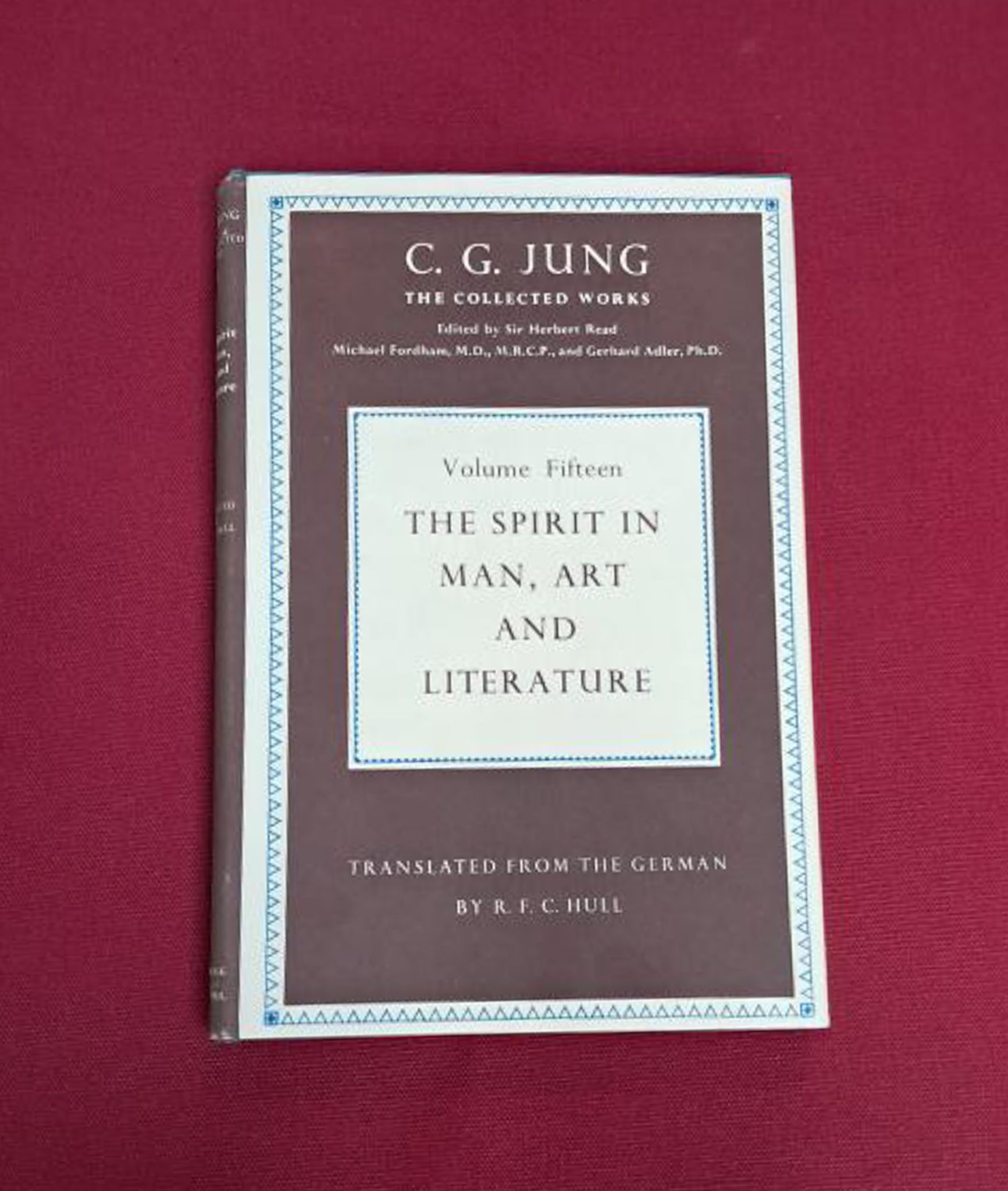 The spirit in man, art and literature. A deep marroon cover with off white boxes containing text